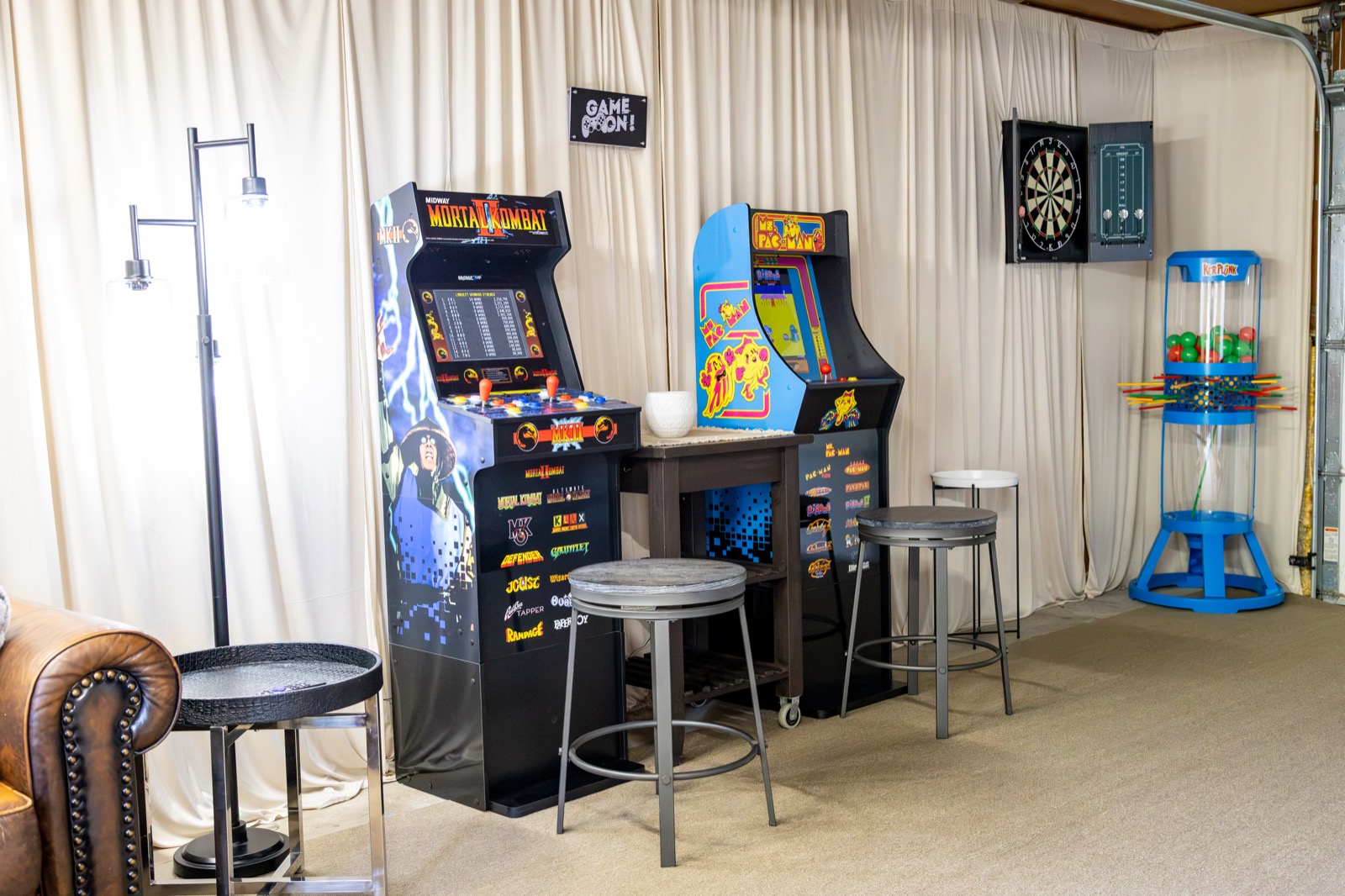 Converted garage game room with arcade cabinets